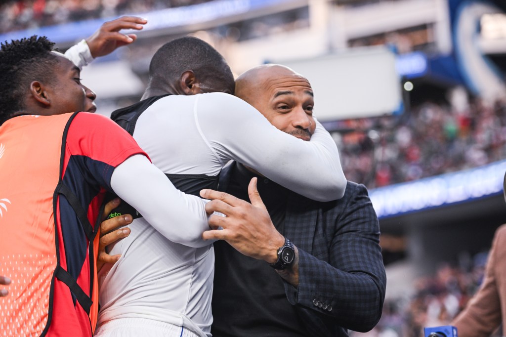 Thierry Henry Swarmed By Celebrating Panama Players
